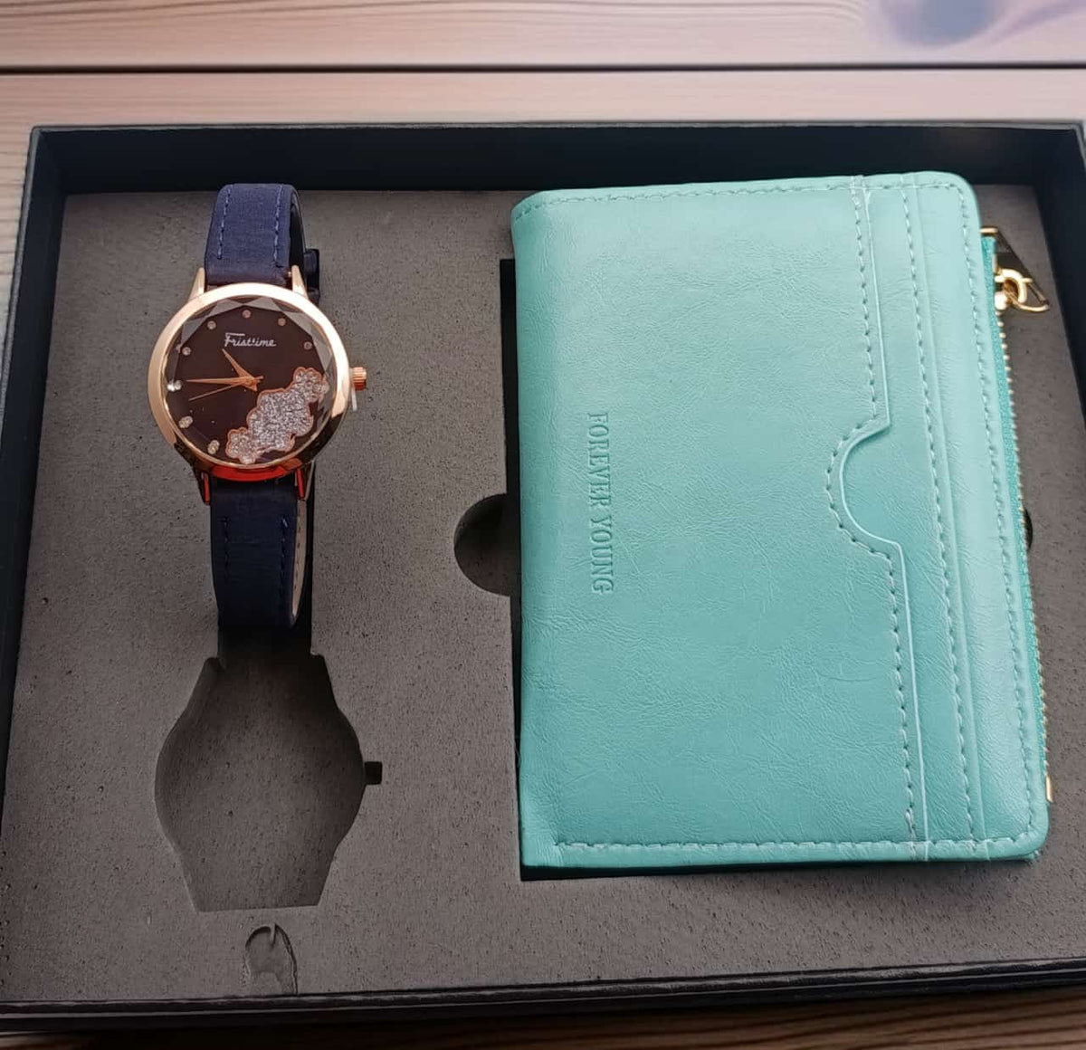 Set de reloj y billetera en caja de regalo