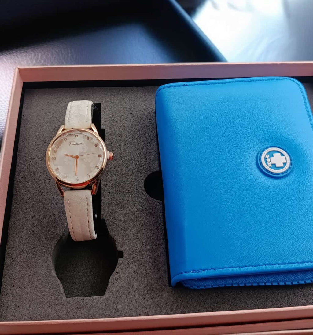 Set de reloj y billetera en caja de regalo